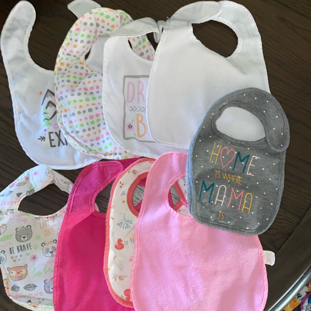 Bundle of bibs with plastic backing